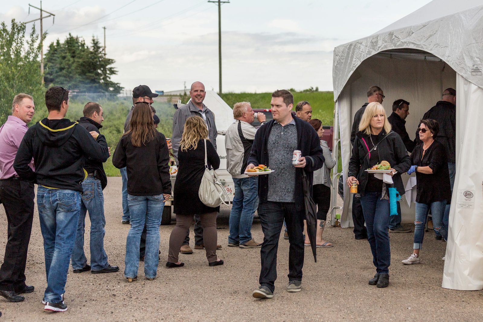 Industry professionals networking at the Bonnyville Oil and Gas Show BBQ